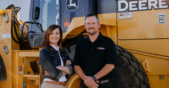 Customer and Ritchie Bros. sales representative Customer and Ritchie Bros. sales representative