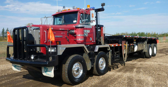 Kenworth C550 T/A Bed Truck